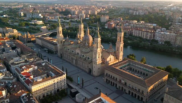 Aerial view of the Cathedral-Basilica of Our Lady of the Pillar in the city of Zaragoza, Aragon, Spain, sunrise golden hour
