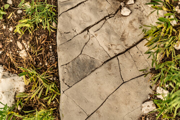 Pretty Cracked Rock Path Outside Dirt Close Up