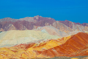 Amazing scenery of Rainbow mountain and blue sky background in sunset