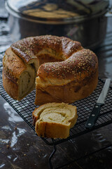bread and knife on a metal stand