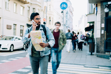 Ethnic tourist feeling lost in city