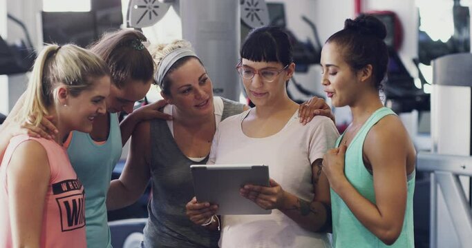 Women team, gym fitness and tablet for workout progress, lose weight results and teamwork or goals. Personal trainer, group and digital technology for training advice, support and talking of health
