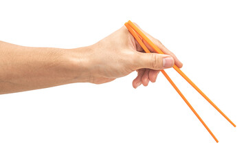 isolated of a man's hand holding a orange plastic chopstick.