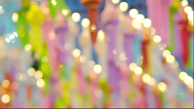 Colorful Lanna paper lanterns hang in Lamphun temples. Popular lantern festival during Loy Krathong in northern Thailand. Traditional Yi Peng paper lantern. The Hundred Thousand Lantern Festival.