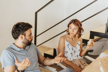Business team collaborating on content strategy and market research in a modern office. Young...