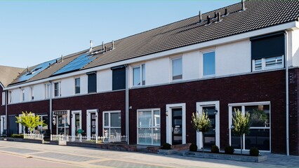 Dutch Suburban area with modern family houses, newly build modern family homes in the Netherlands, dutch family house in the Netherlands, Street with modern family houses in urban suburb  - obrazy, fototapety, plakaty