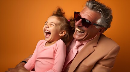 portrait of child and their grandparent laughing happily