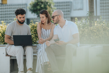 Young architects and construction engineers collaboratively discuss a blueprint outdoors at a construction site. They plan a modernized structure, demonstrating effective teamwork and communication.