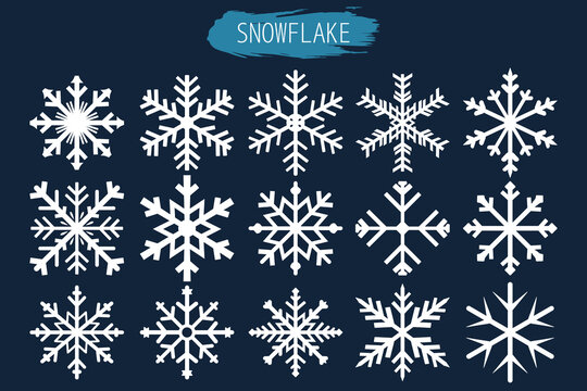 a close up of a snowflake set on a dark background