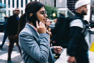  positive businesswoman calling to partner