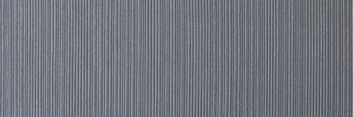 Grey fabric with thin white stripes for sale in atelier