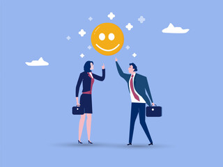 Happy businessman and woman holding smiling face symbol in joyful workplace.Employee happiness, job satisfaction or company benefit, happy workplace or positive attitude, work motivation concept.