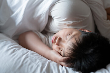 asian boy sleep on bed, child sick, kid sleep - Powered by Adobe