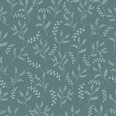Floral seamless pattern with branches and leaves on a green background