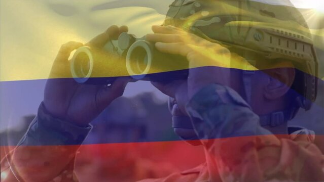 Animation of flag of colombia waving over caucasian soldier looking through binocular