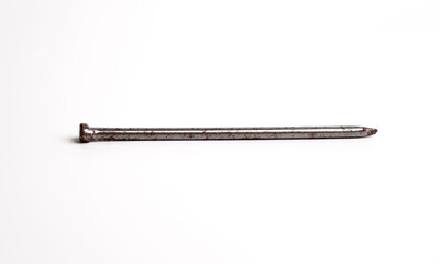 One Silver Shiny Sharp Metal Nail Closeup Photo Isolated On White Background