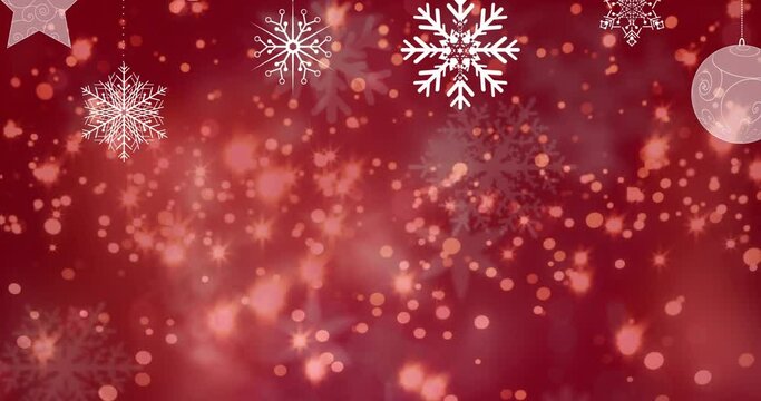 Animation of lens flares, leaves, snowflakes, hanging baubles and stars over red background