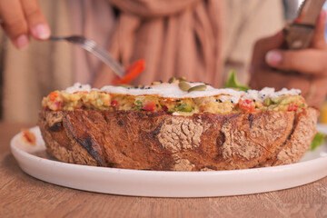 Tasty fresh toast with avocado and egg