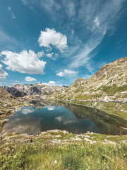 Fototapeta na wymiar Reflection on lake in Italy