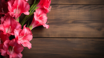 Naklejka na ściany i meble Gladiolus Flower on a Wood Background with Copy Space