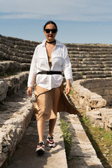 tourist in The ruins of ancient Anatolian city of Perge located near the Antalya city in Turkey
