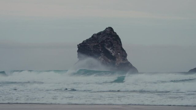 Powerful Waves Crashing On Lion's Head Rock In Sandfly Bay Near Dunedin, New Zealand. Slow Motion