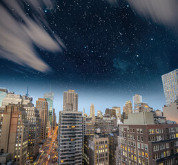 Manhattan skyline at night, aerial view of New York City