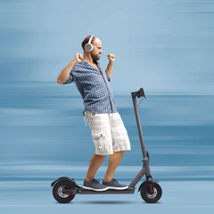 Man riding a scooter hands free and dancing