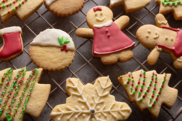 Decorated christmas cookies with copy space on grey background