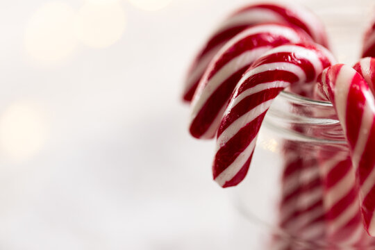 Naklejki Jar of christmas candy canes with copy space on whtie background