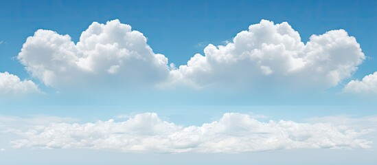 Garage view of fluffy cumulus clouds in blue sky With copyspace for text
