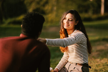 Young couple enjoying a park on a sunny day