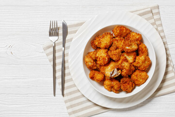 crispy fried panko breaded chicken bites in bowl