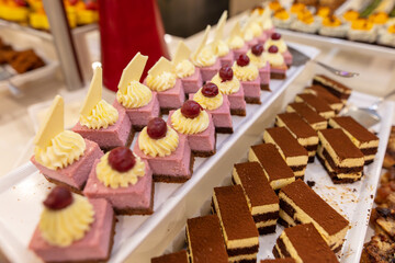 Sweet cakes on display in a restaurant