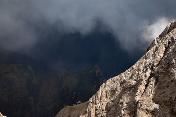 Panoramic view from the top of the Marmolada Glacier in summer mist, Dolomites,  South Tyrol, Italy.