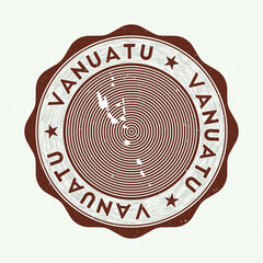 Vanuatu seal. Country round logo with shape of Vanuatu and country name in multiple languages wordcloud. Amazing emblem. Authentic vector illustration. - obrazy, fototapety, plakaty