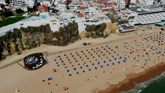 Drone shot of a large beach full of pale fat brits (but you can&acute;t see that).
