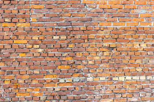 Red brick wall as an abstract background. Texture