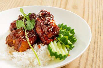 Rice topped with teriyaki sauce  and vegetables