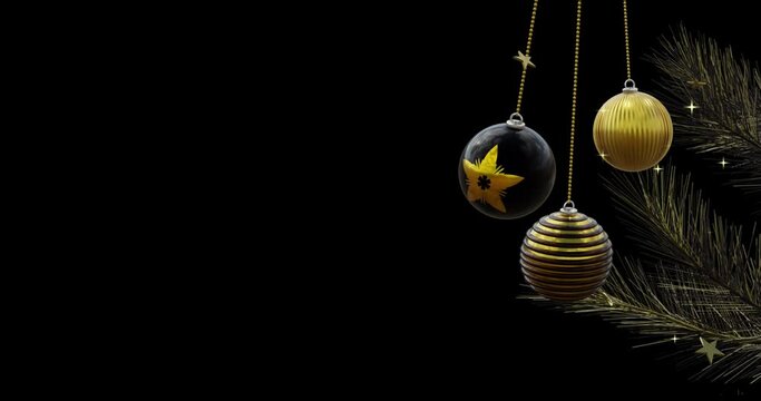 Black and gold christmas baubles swinging on tree with gold stars on black background, copy space