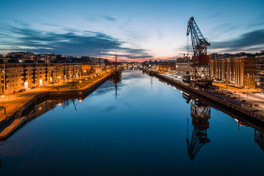 Cityscape of Turku, Finland at dawn and the calm aurajoki river in the city downtown