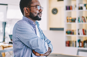 Confident black man in library