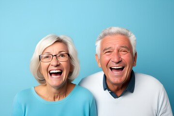 Portrait of a Fictional Lovely Senior Couple wearing plain blank t-shirt on a colored background. Generative AI Illustration. - obrazy, fototapety, plakaty