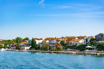 Croatian seaside town with houses with red roofs