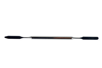 Double ended flat dental spatula isolated in white. Dentist's tool