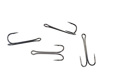 Hooks(offset) for professional spinning fishers isolated on white.