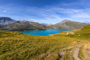 Naklejka na ściany i meble Panoramic view of the Mont-Cenis lake near the Mont-Cenis hill between the Italian Val di Susa and the French Maurienne valley, France