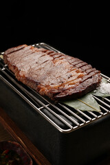 Medium rare sliced grilled striploin beef steak