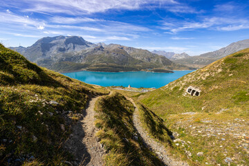 Fototapeta na wymiar Panoramic view of the Mont-Cenis lake near the Mont-Cenis hill between the Italian Val di Susa and the French Maurienne valley, France