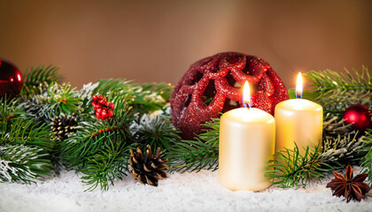 Christmas and New year Holiday Card, candle , fir tree branches with decorative ornaments on snow